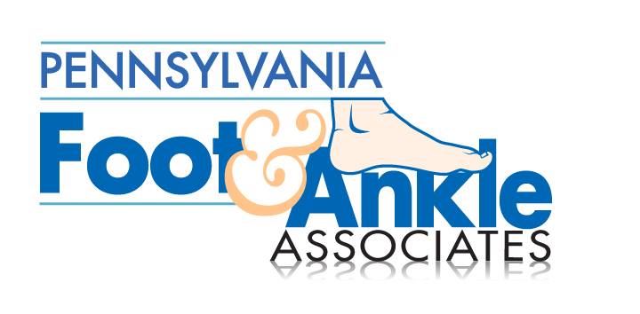 Pennsylvania Foot & Ankle Associates logo – The Pennsylvania Surgery and Laser Center Logo of Pennsylvania Foot & Ankle Associates showing bold blue text with an orange ampersand and an illustrated foot above the word “Ankle,” symbolizing specialized podiatry and foot care services – The Pennsylvania Surgery and Laser Center