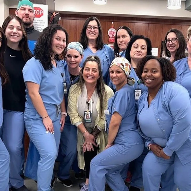 Medical team group photo – The Pennsylvania Surgery and Laser Center A group of smiling healthcare professionals dressed in scrubs and work attire gather together for a team photo, reflecting collaboration, compassion, and dedication to patient care – The Pennsylvania Surgery and Laser Center